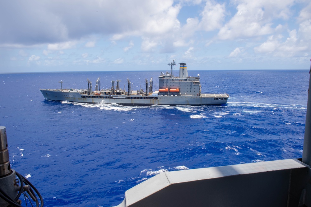 USS Ronald Reagan (CVN 76) conducts a fueling-at-sea and replenishment-at-sea with USNS Rappahannock (T-AO 204) and USNS Cesar Chavez (T-AKE 14)