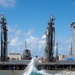 USS Ronald Reagan (CVN 76) conducts fueling-at-sea and replenishment-at-sea with USNS Rappahannock (T-AO 204) and USNS Cesar Chavez (T-AKE 14)