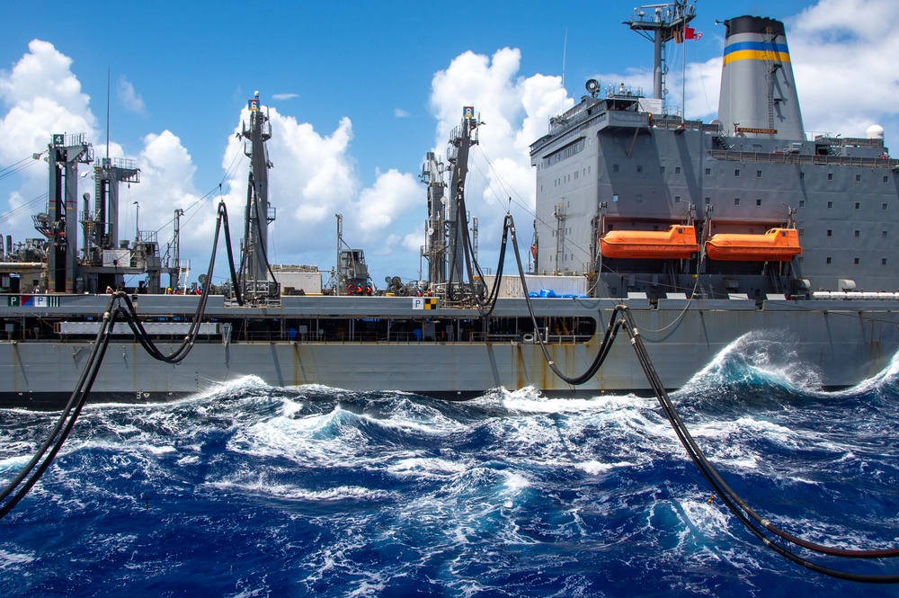 USS Ronald Reagan (CVN 76) conducts fueling-at-sea and replenishment-at-sea with USNS Rappahannock (T-AO 204) and USNS Cesar Chavez (T-AKE 14)