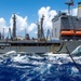 USS Ronald Reagan (CVN 76) conducts fueling-at-sea and replenishment-at-sea with USNS Rappahannock (T-AO 204) and USNS Cesar Chavez (T-AKE 14)