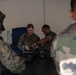 U.S. Marines, French soldiers clean FAMAS rifles during Marara 24