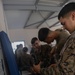 U.S. Marines, French soldiers clean FAMAS rifles during Marara 24