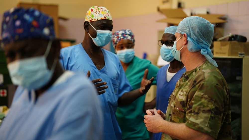 American and Chadian military medical professional works to treat Chadian pediatric patient injuries from June 18 ammunition depot blast