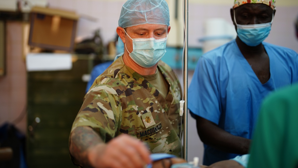 American and Chadian military medical professionals work to treat Chadian pediatric patient injuries from June 18 ammunition depot blast