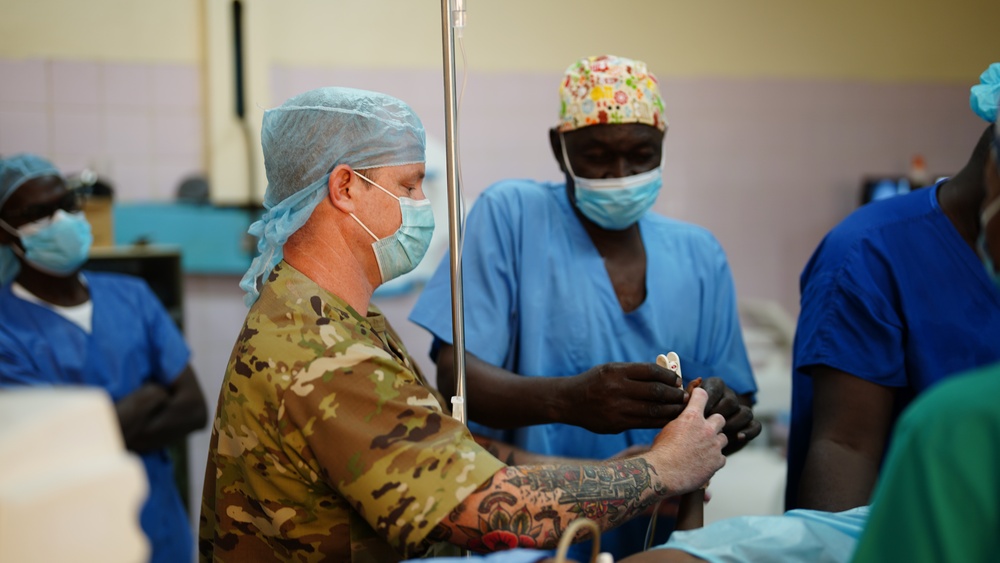 American and Chadian military medical professionals work to treat Chadian pediatric patient injuries from June 18 ammunition depot blast