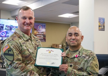 Soldier and Civilians recognized by 1st TSC commanding general
