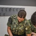 Midshipmen Candidates Conduct Small Arms Familiarization