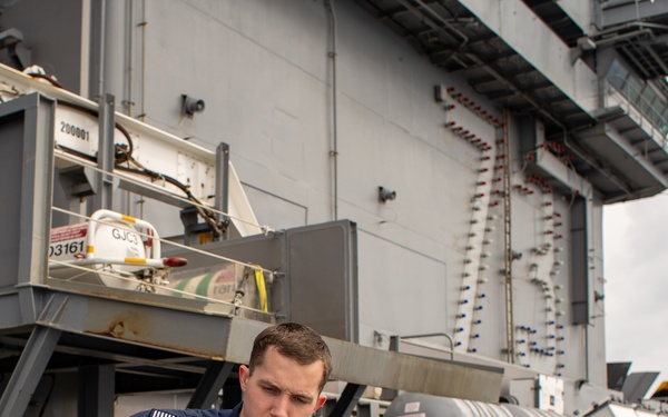 George Washington Sailors conduct maintenance on radar equipment.