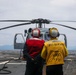 Sailors aboard the USS Howard conduct flight quarters in the Pacific Ocean