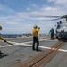 Sailors aboard the USS Howard conduct flight quarters in the Pacific Ocean
