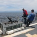 Sailors aboard the USS Howard conduct flight quarters in the Pacific Ocean