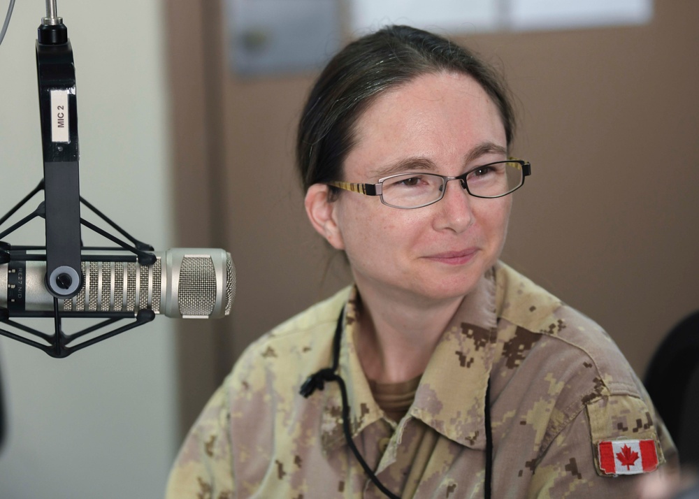 Cmdr. Braxton speaks to Canadian Lt. Cmdr. Davidson-Arnott about Mental Wellness on Deployments During Wellness Wednesday on AFN Bahrain