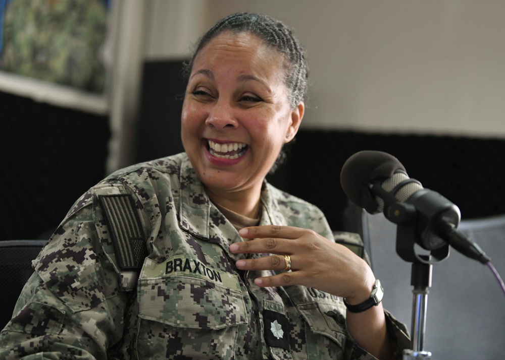 Cmdr. Braxton speaks to Canadian Lt. Cmdr. Davidson-Arnott about Mental Wellness on Deployments During Wellness Wednesday on AFN Bahrain