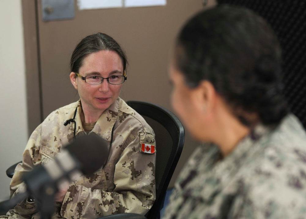 Cmdr. Braxton speaks to Canadian Lt. Cmdr. Davidson-Arnott about Mental Wellness on Deployments During Wellness Wednesday on AFN Bahrain