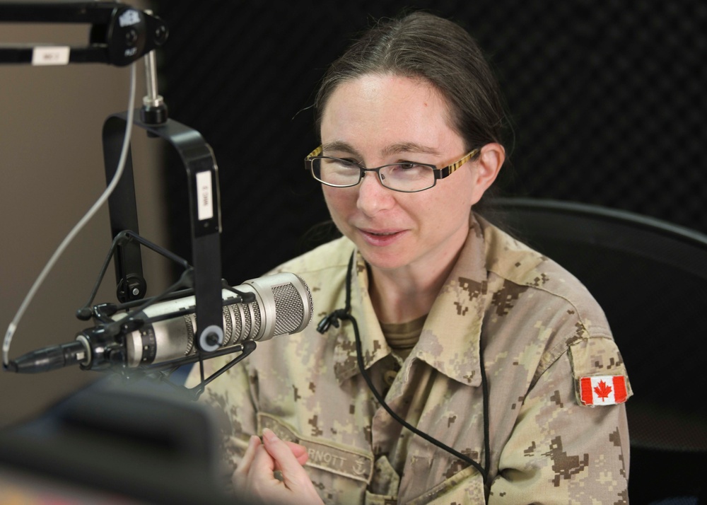 Cmdr. Braxton speaks to Canadian Lt. Cmdr. Davidson-Arnott about Mental Wellness on Deployments During Wellness Wednesday on AFN Bahrain