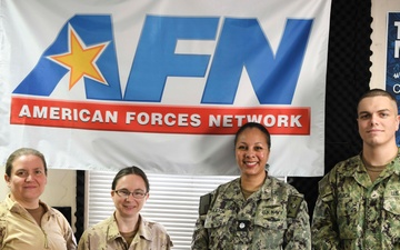 Cmdr. Braxton speaks to Canadian Lt. Cmdr. Davidson-Arnott about Mental Wellness on Deployments During Wellness Wednesday on AFN Bahrain