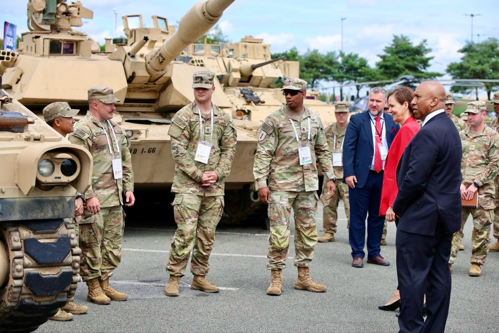 Ambassador Denise Bauer visits with U.S. Army soldiers at EUROSATORY 2024