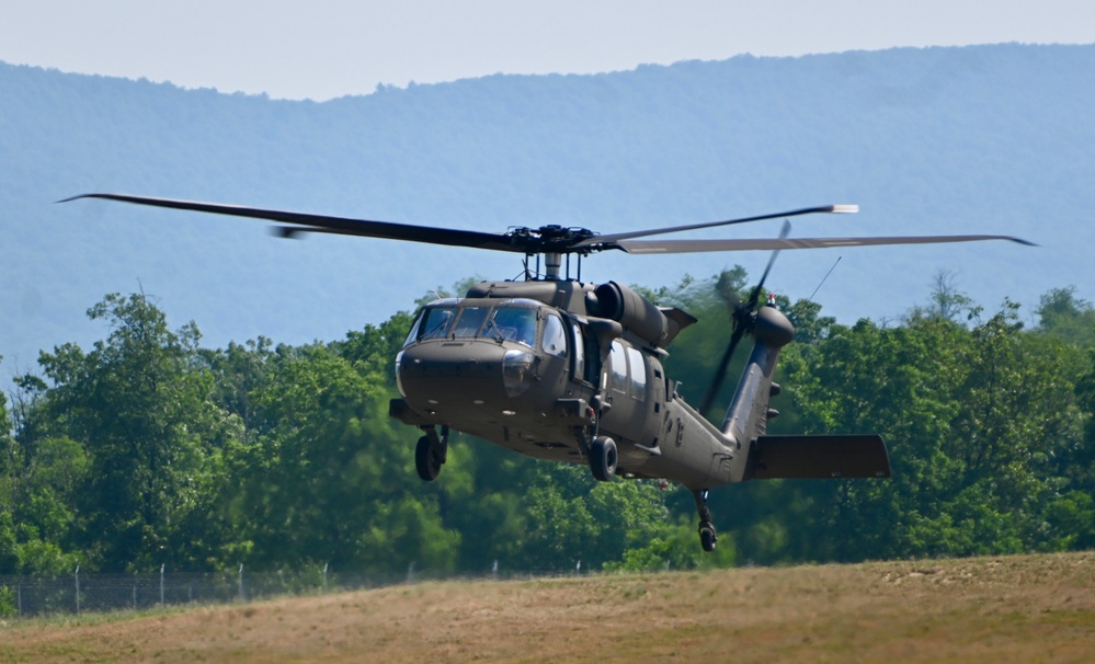 UH-60 Black Hawk Helicopters fly around Fort Indiantown Gap