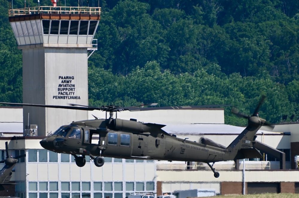 UH-60 Black Hawk Helicopters fly around Fort Indiantown Gap