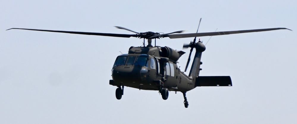 UH-60 Black Hawk Helicopters fly around Fort Indiantown Gap
