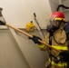 Sailor Practices Fire-Fighting