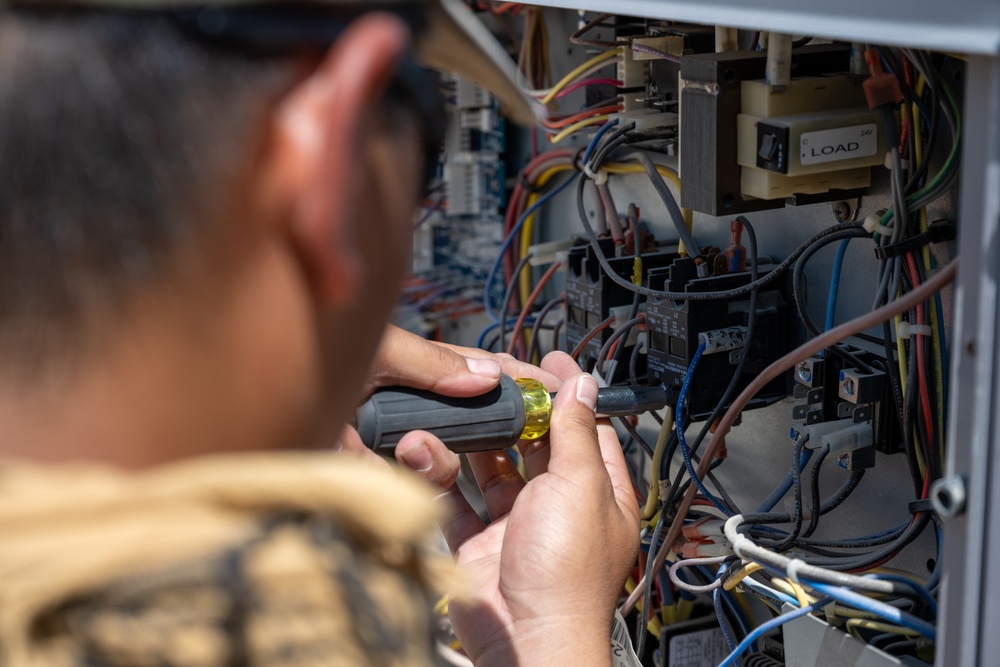 379th ECES HVAC technicians combat rising temperatures
