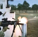 Combat medics use the M249 light machine gun during a field observational assessment