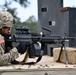 Combat medics use the M249 light machine gun during a field observational assessment