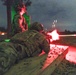 Combat medics use the M249 light machine gun during a field observational assessment