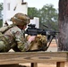 Combat medics use the M249 light machine gun during a field observational assessment