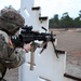 Combat medics use the M249 light machine gun during a field observational assessment