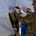 Army Cpl. Patrick Dayton (R) Receives Silver Medal in Track Event During 2024 DoD Warrior Games