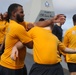 Sailors aboard the USS Howard participate in a security reaction force class in the East China Sea