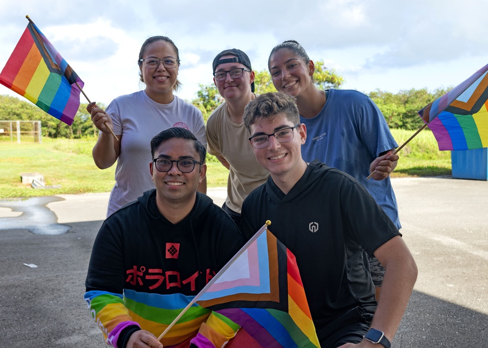 Sailors and Staff Pose for a Photo during Pride Celebrations