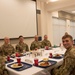 Brig. Gen. David Johnson has lunch with members of the 179th Cyberspace Wing.