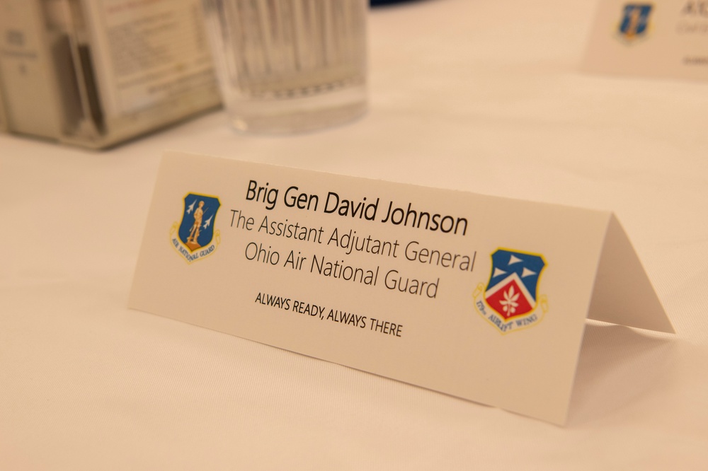 Brig. Gen. David Johnson has lunch with members of the 179th Cyberspace Wing.