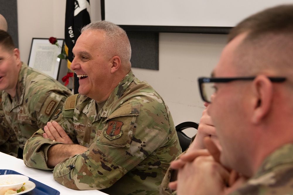 Brig. Gen. David Johnson has lunch with members of the 179th Cyberspace Wing.