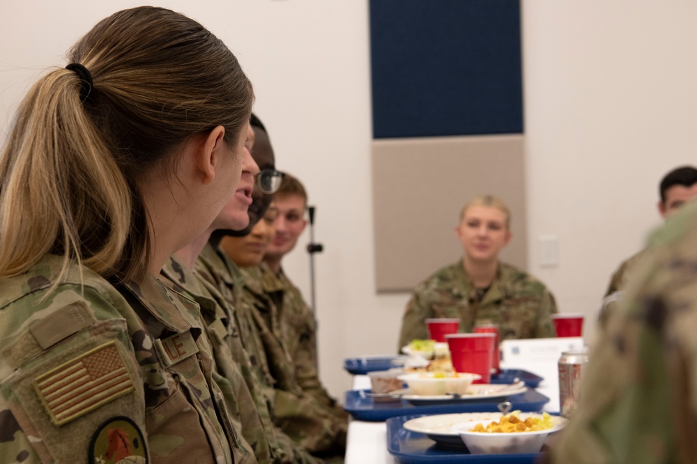 Brig. Gen. David Johnson has lunch with members of the 179th Cyberspace Wing.