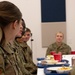 Brig. Gen. David Johnson has lunch with members of the 179th Cyberspace Wing.