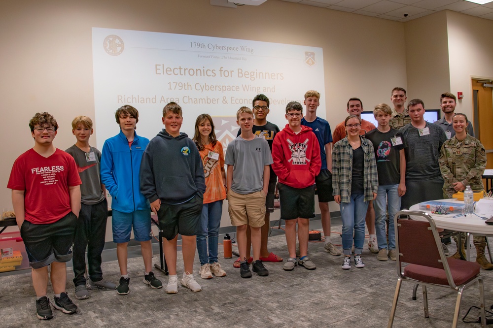 Capt. Melissa Steele, Chief of Training 179th Cyberspace Wing Operation Support Squadron, leads an Electronics for Beginners Workshop.