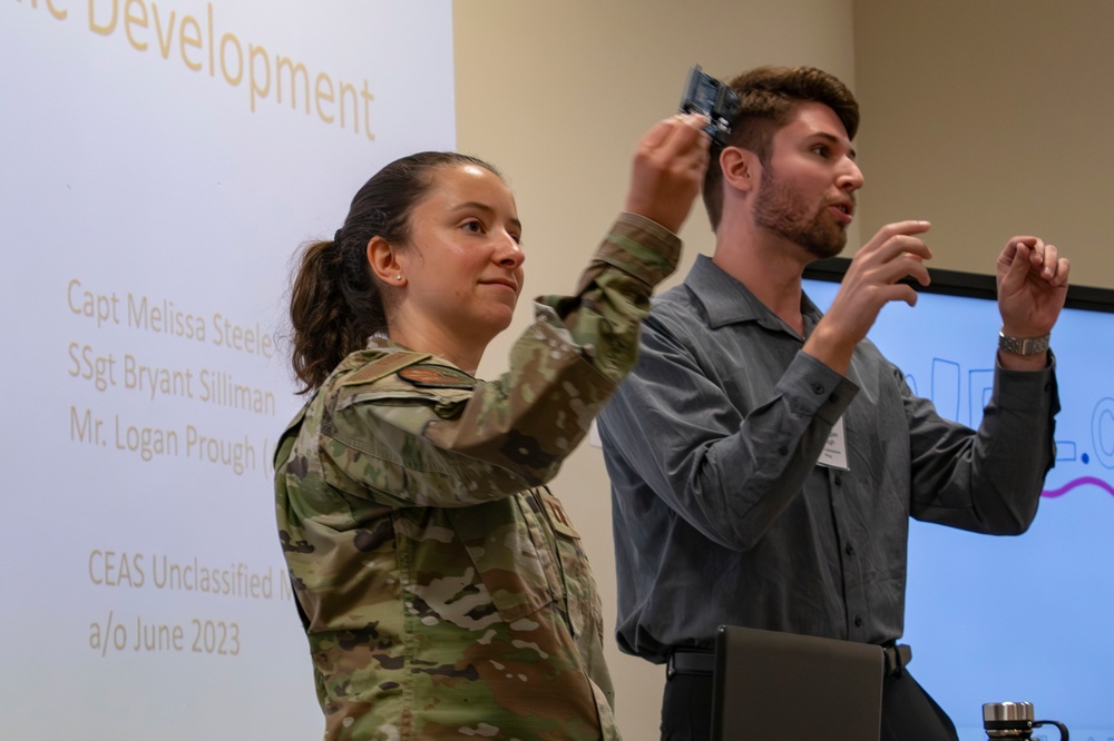 Capt. Melissa Steele, Chief of Training 179th Cyberspace Wing Operation Support Squadron, leads an Electronics for Beginners Workshop.