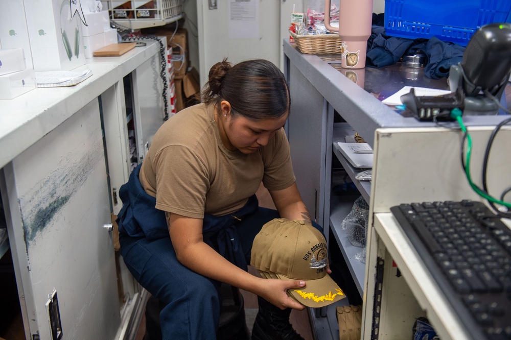 USS Ronald Reagan (CVN 76) Sailors conduct inventory in ship’s store