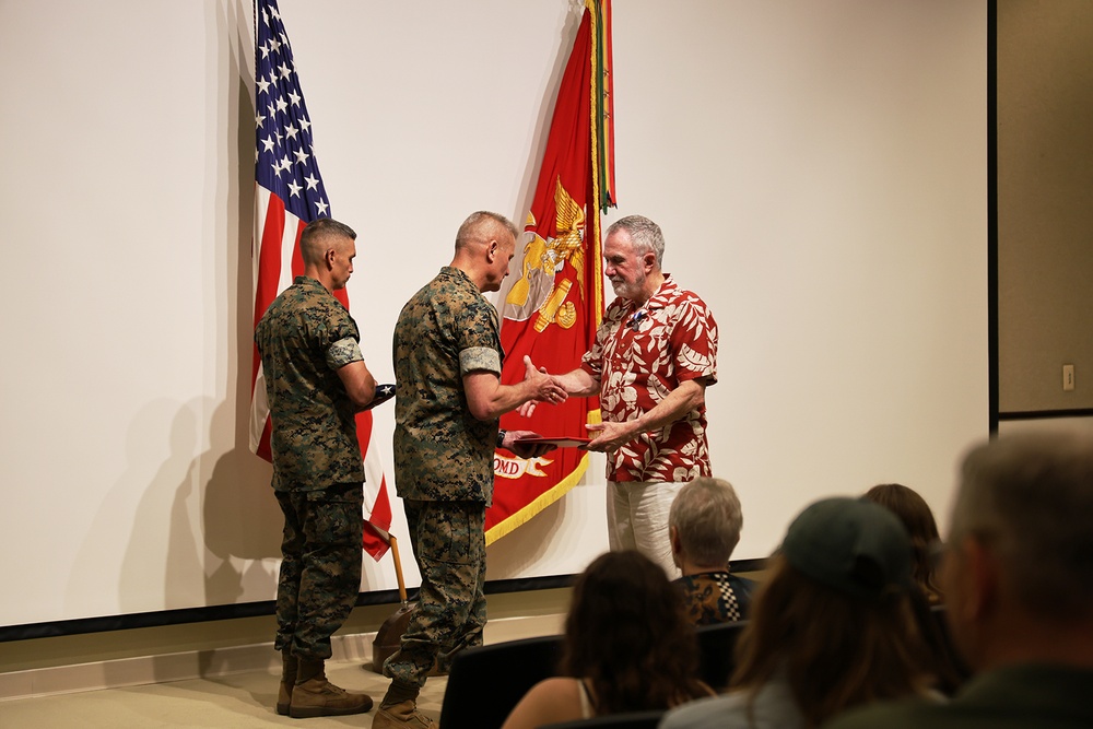Marine Corps Combat Development and Integration civilian employee retires