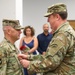 New York Army National Guard Col. Marshall Hunt pins new rank onto Command Sergeant Major Michael Richardson