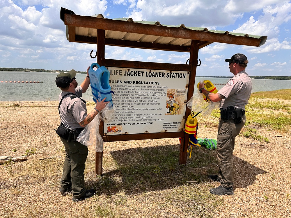 Refilling Benbrook Lake life jacket loaner station