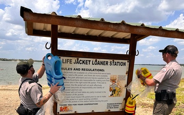 Refilling Benbrook Lake life jacket loaner station