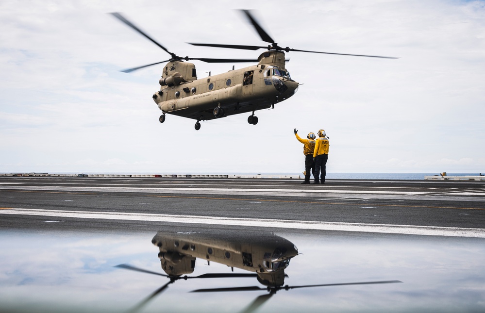 An Army CH-47 Chinook Conducts Deck Landing Qualifications on George Washington