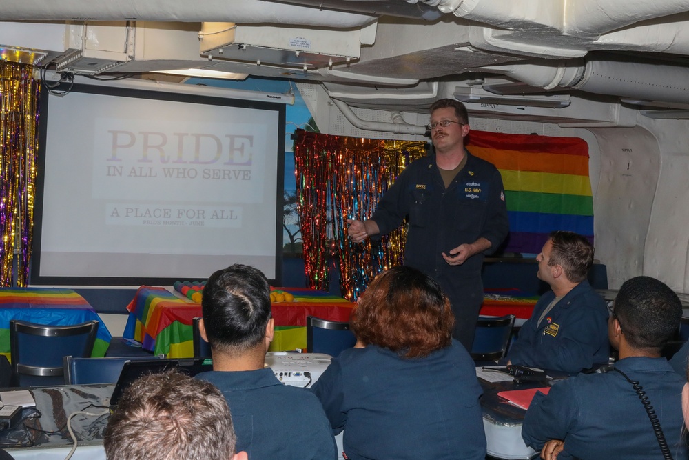 Sailors aboard the USS Howard hold a pride month celebration in the East China Sea