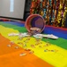 The USS Howard holds a pride month celebration on the mess decks in the East China Sea