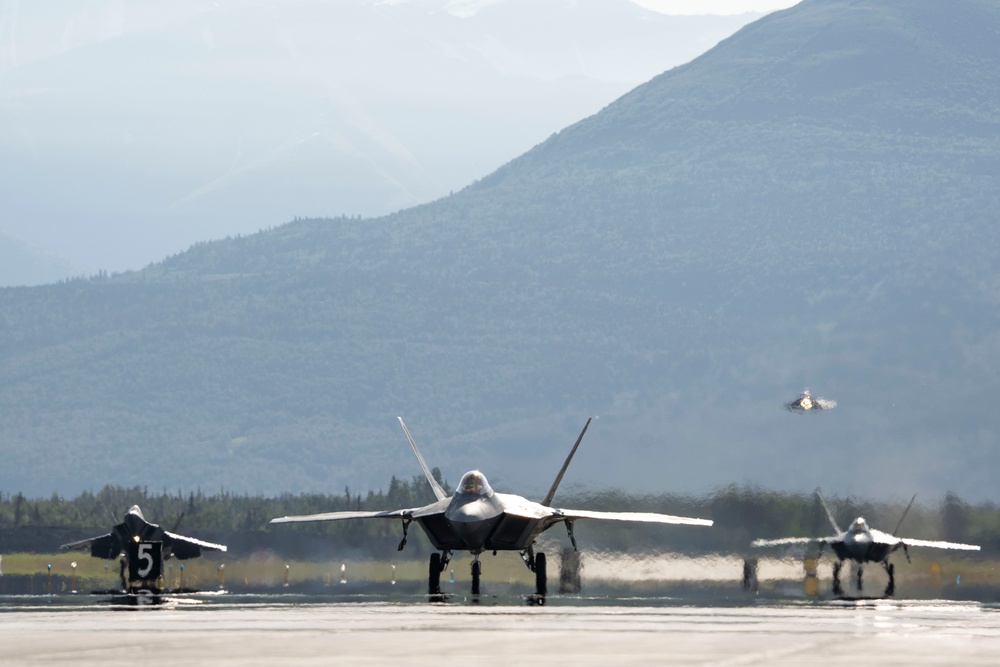 USAF F-22 Raptors and German Air Force PA-200 Tornados train at JBER